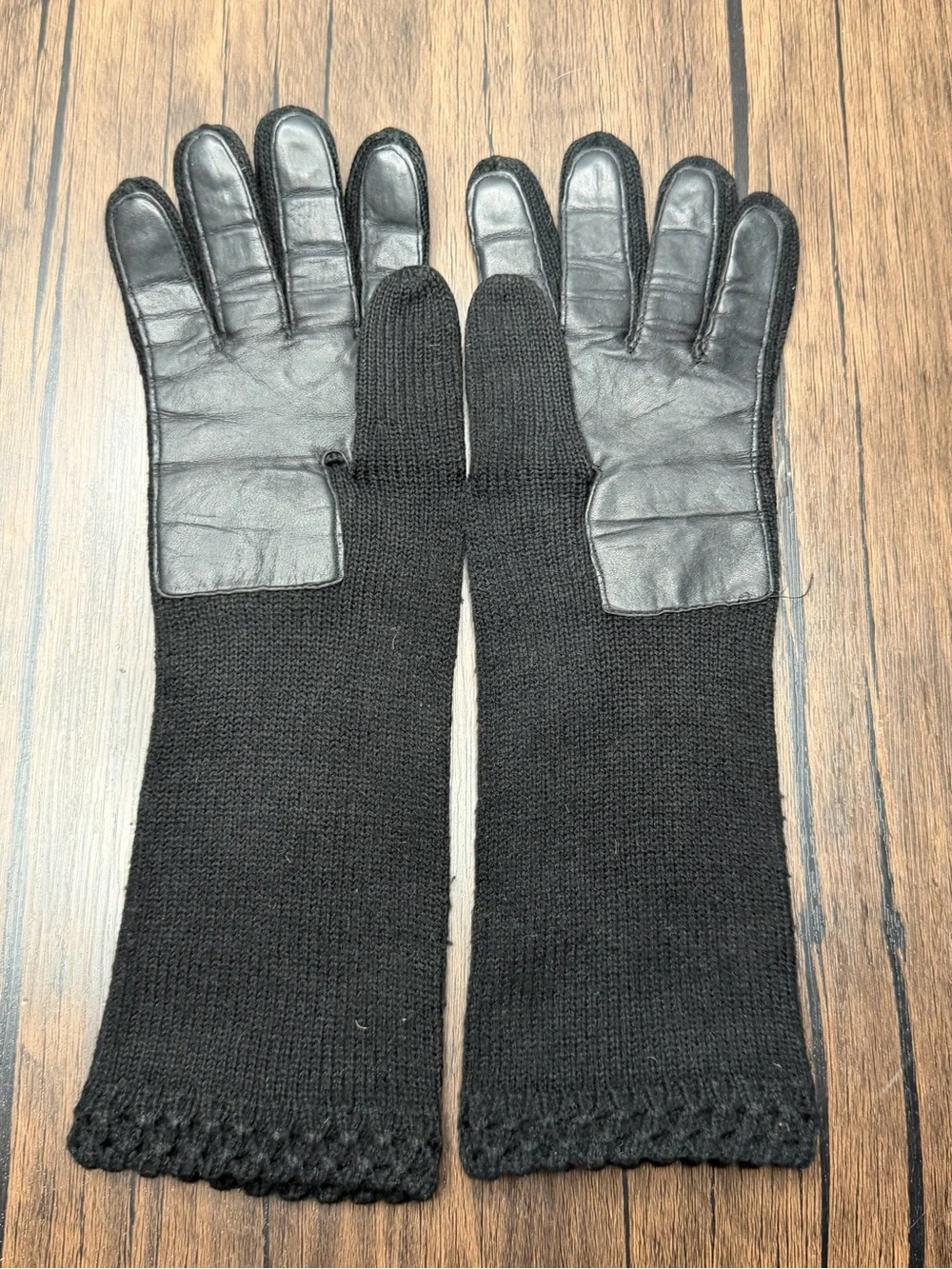 Vintage long black knit gloves featuring a textured cuff